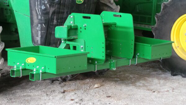 A green Rock Box for John Deere 8000 Series without Weights tractor with a green bucket attached to it.