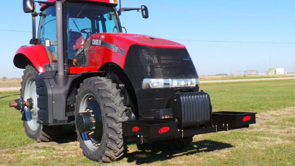 A Rock Box for Case IH Magnum parked on a grassy field.