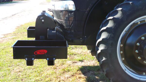 A Rock Box for Case IH Magnum tractor on a grassy field.