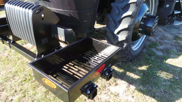 A black Rock Box for Case IH Magnum with a basket attached to it.