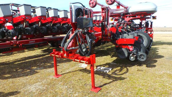 A Offset 3 Point Planter Hitch for Case IH 1200 Series sits on a field.