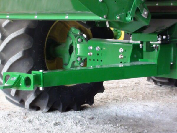 A close up of the front of a Combine Tow Hitch for JD "S" Series 2013 and newer tractor.