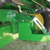 A close up of the front end of a Combine Tow Hitch for JD "S" Series 2012 tractor.