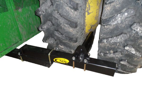 A green Mud Scraper for John Deere "S" and "STS" Series with a tire attached to it.