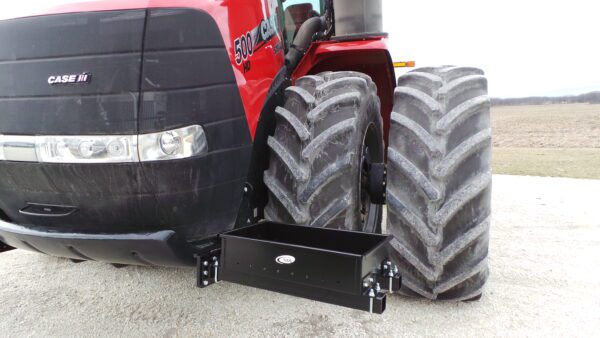 A red Rock Box for Case Steiger with Quadtrac - 400HP and Larger tractor with a large tire on it.