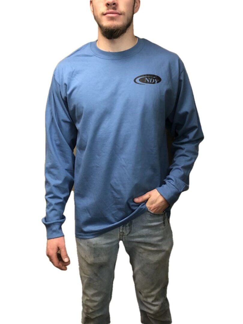 A man wearing a blue NDY Long Sleeve Men's T-shirt