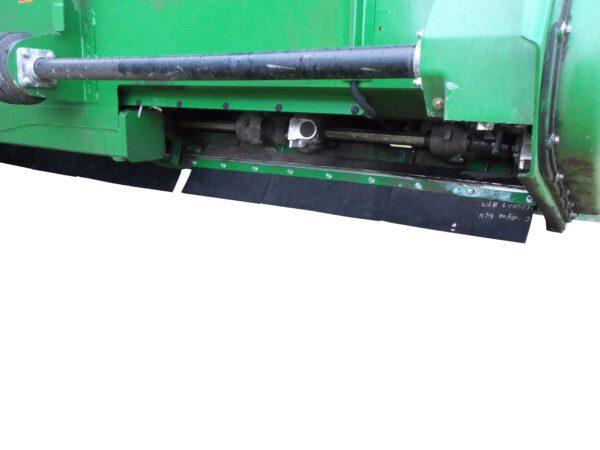 A green Skirt Kit for John Deere 612/712 - 20/22" row spacing with a blade attached to it.